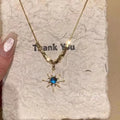 Dreamy Blue Crystal Sunburst Pendant Necklace – Pavé Zircon Starburst Gold Clavicle Chain for Women