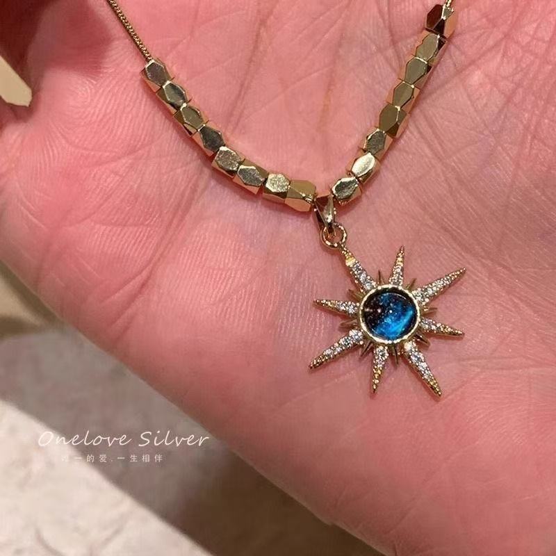Dreamy Blue Crystal Sunburst Pendant Necklace – Pavé Zircon Starburst Gold Clavicle Chain for Women