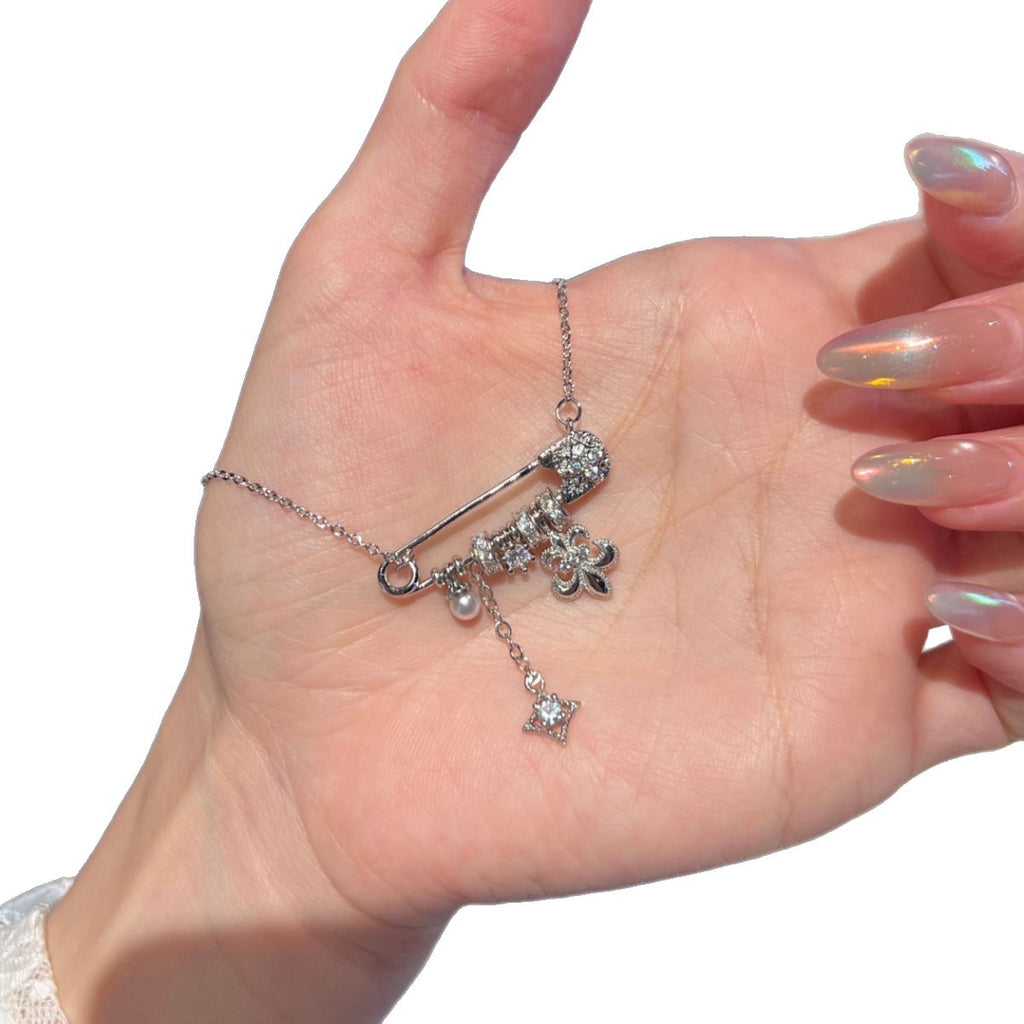 Brushed Gold Fleur-de-lis Safety Pin Pendant Necklace – Pearl & Starburst Charm Dainty Clavicle Chain for Women