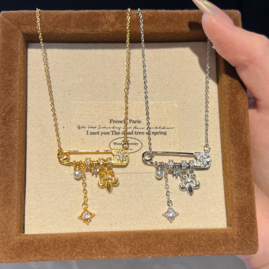 Brushed Gold Fleur-de-lis Safety Pin Pendant Necklace – Pearl & Starburst Charm Dainty Clavicle Chain for Women
