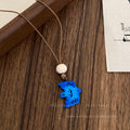 Minimalist Gradient Blue Swallow Pendant Long Cord Necklace – Niche Artistic Bird Charm Sweater Chain for Women