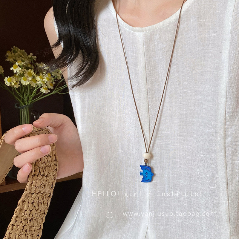 Minimalist Gradient Blue Swallow Pendant Long Cord Necklace – Niche Artistic Bird Charm Sweater Chain for Women