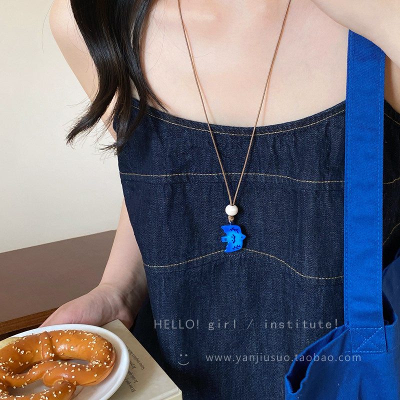 Minimalist Gradient Blue Swallow Pendant Long Cord Necklace – Niche Artistic Bird Charm Sweater Chain for Women