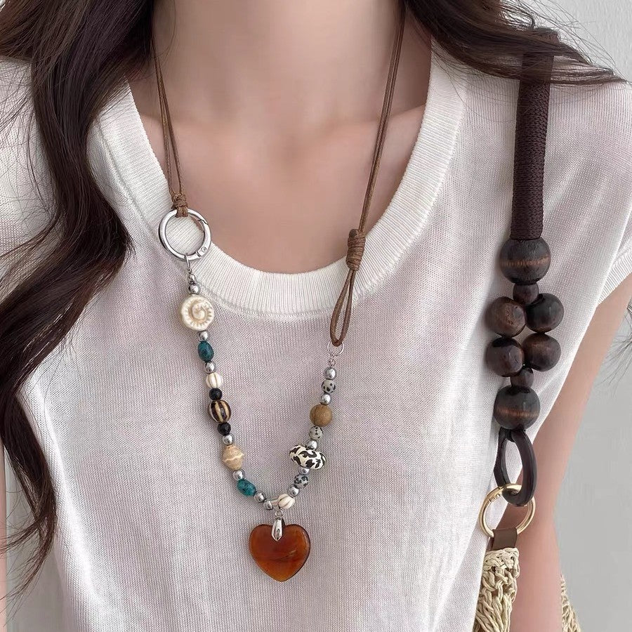 Ethnic Boho Amber Resin Heart Pendant Long Cord Necklace – Hand-Beaded Vintage Sweater Chain for Women