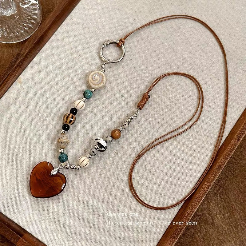 Ethnic Boho Amber Resin Heart Pendant Long Cord Necklace – Hand-Beaded Vintage Sweater Chain for Women