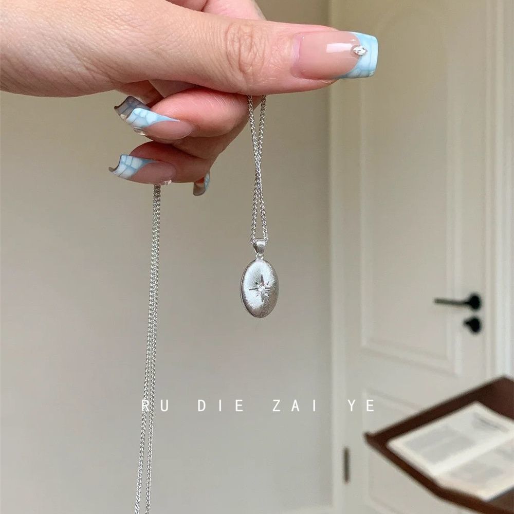 Vintage North Star Oval Coffee Bean Pendant Necklace – Brushed Gold Starburst CZ Clavicle Chain for Women